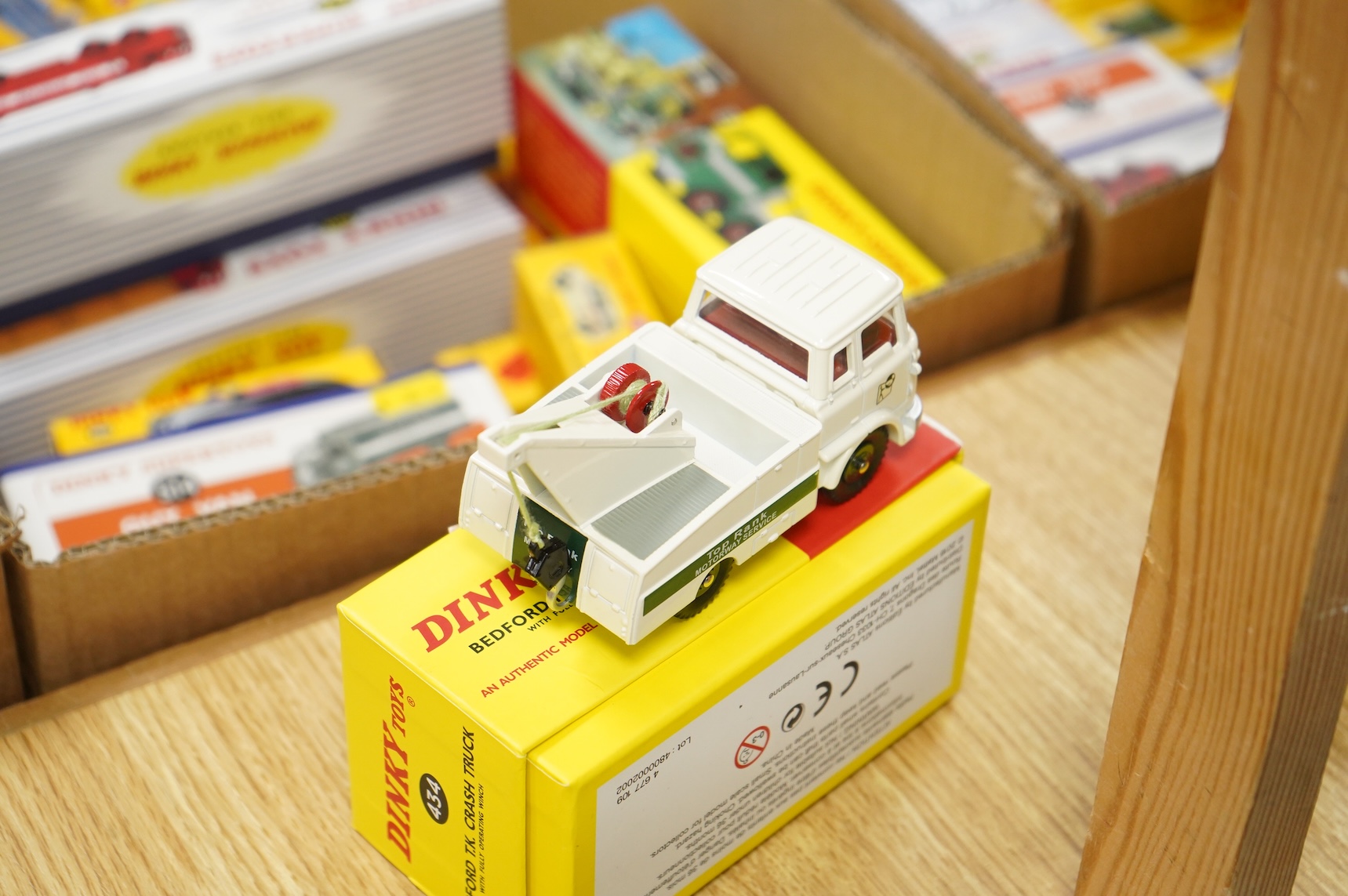 Twenty-two boxed Atlas Dinky Toys, including cars and commercial vehicles, Leyland tankers, sports cars, etc.